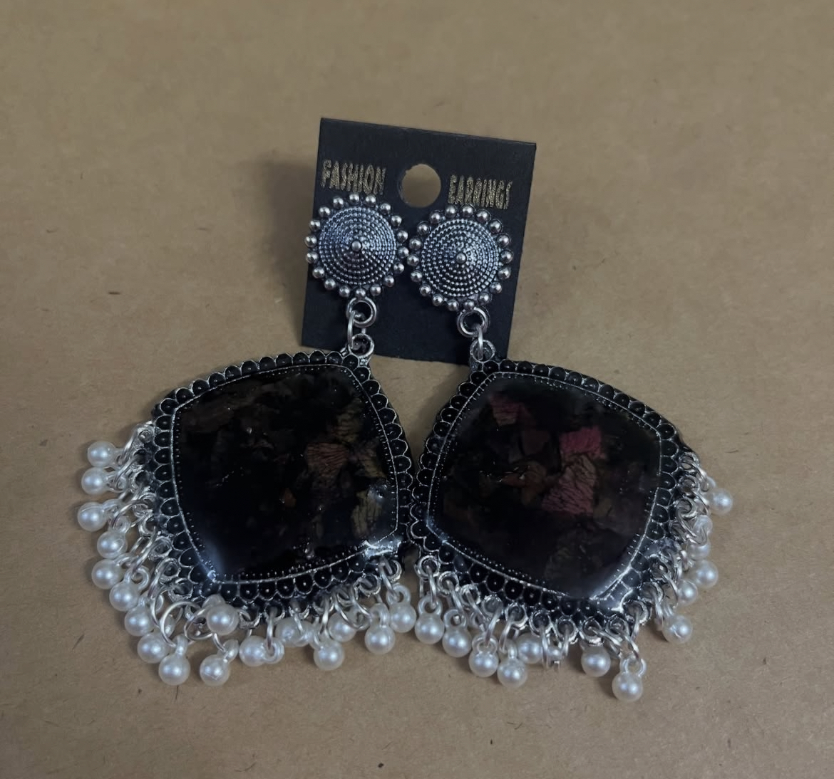 Resin earing flower preservation